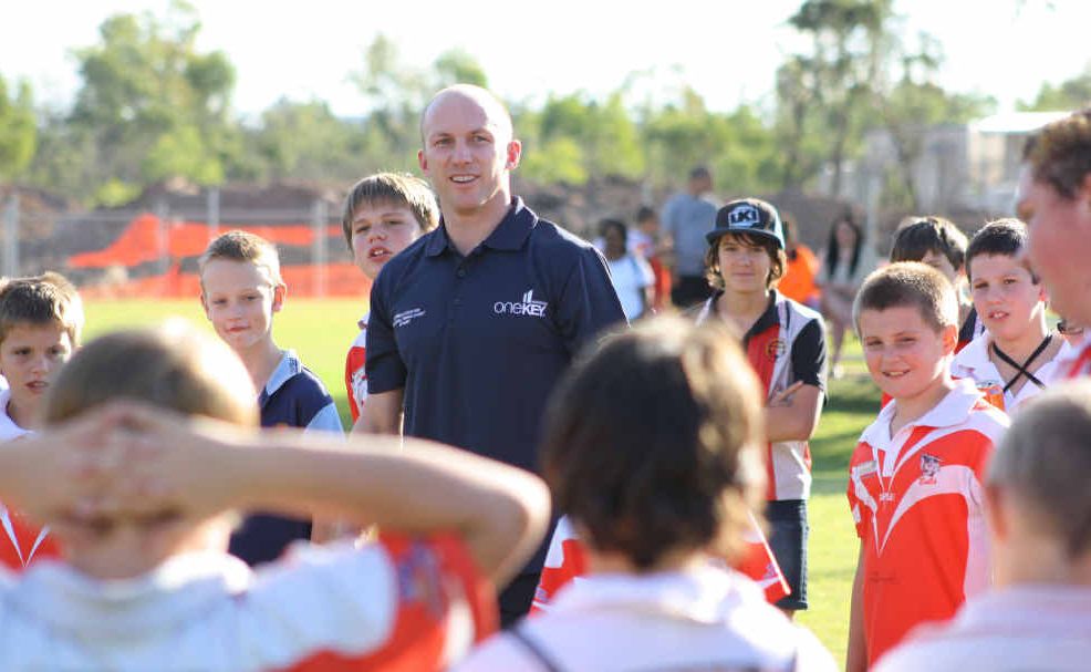 Darren Lockyer is swamped by junior fans during a visit to Dysart last week. Darren Lockyer is swamped by junior fans during a visit to Dysart last week.